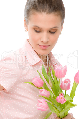 Fashion - young romantic woman with spring tulips