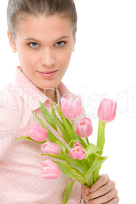 Fashion - young romantic woman with spring tulips