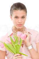 Fashion - young romantic woman with spring tulips