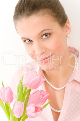 Fashion - young romantic woman with spring tulips