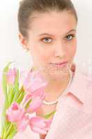 Fashion - young romantic woman with spring tulips
