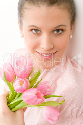 Fashion - young romantic woman with spring tulips