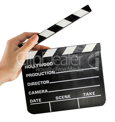 A hand holding a clapper board