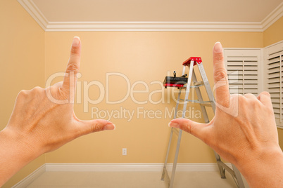 Female Hands Framing Beautiful Room Interior