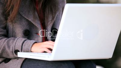 Pretty Young Student With Laptop