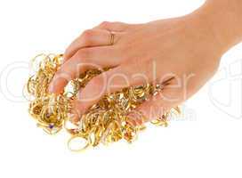 Golden rings covered by a hand
