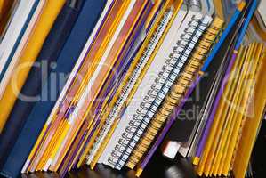 Notebooks on shelf