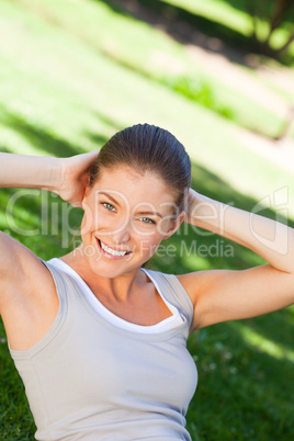 Woman doing her stretches in the park