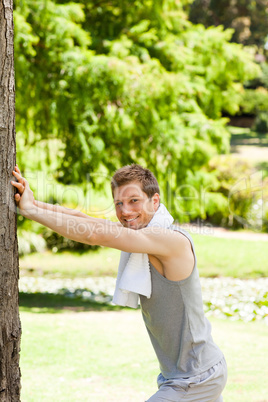 Man doing his stretches in the park