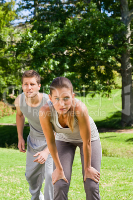 Exhausted couple in the park