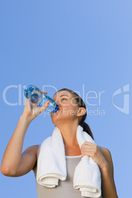 Young woman drinking water