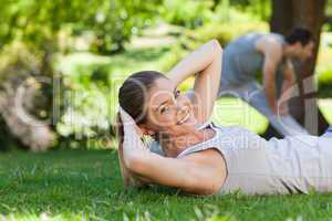 Couple doing their stretches in the park