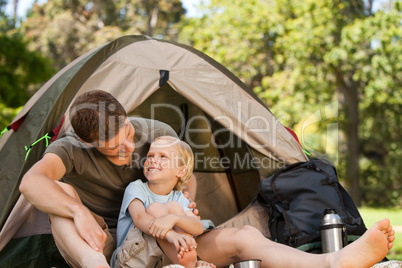 Father and his son camping