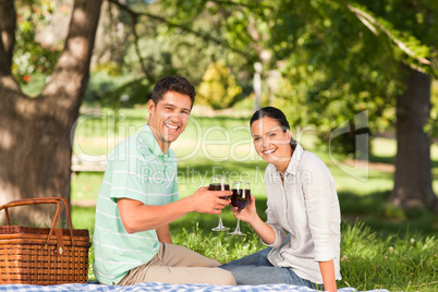 Young couple  picnicking in the park