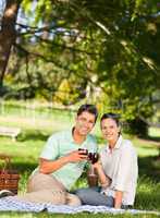 Young couple  picnicking in the park