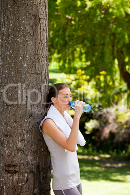 Young woman drinking water