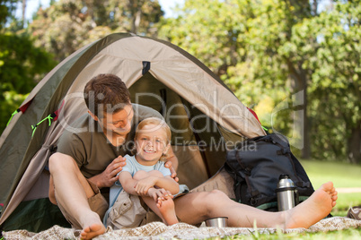 Father and his son camping
