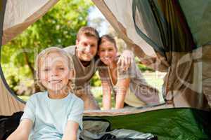 Happy family camping in the park