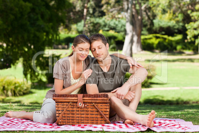 Couple picnicking in the park