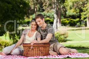 Couple picnicking in the park