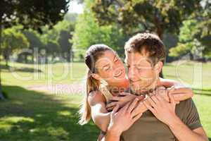 Woman hugging her handsome husband