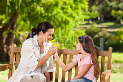 Smiling mother with her daughter