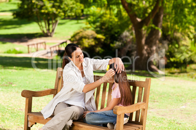 Smiling mother with her daughter