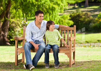 Father with his son on the bench