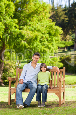 Father with his son on the bench