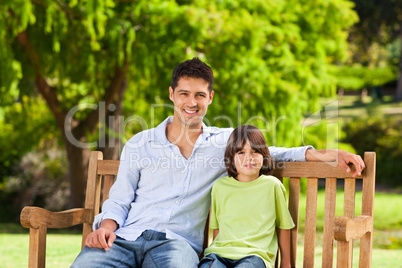 Father with his son on the bench