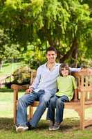 Father with his son on the bench