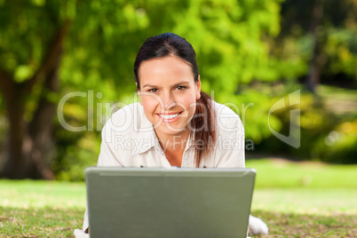 Young woman working on her laptop Young woman working on her laptop