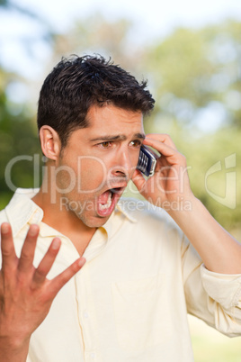 Man phoning in the park