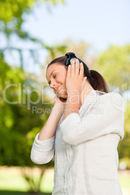 Beautiful woman listening to music