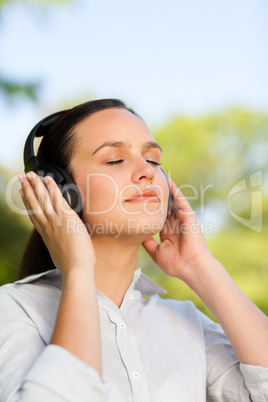 Beautiful woman listening to music