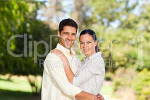 Happy lovers in the park