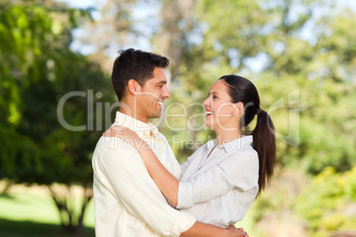 Happy lovers in the park