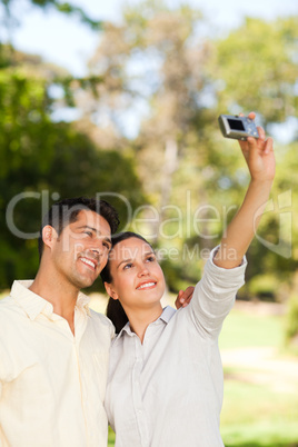 Young couple taking a photo of themselve