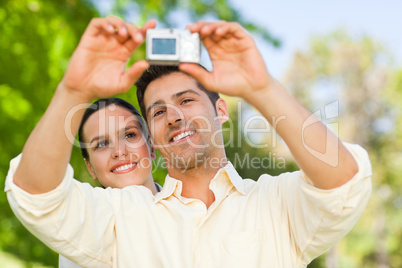 Couple taking a photo of themselve