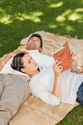 Couple reading in the park