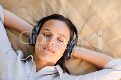 Young woman listening to music