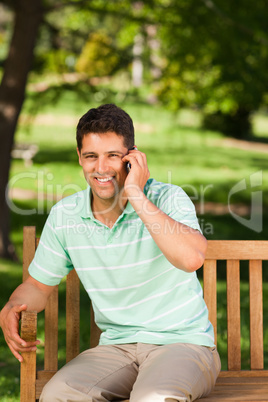 Young handsome man phoning