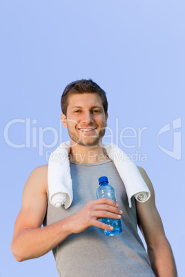 Man drinking water after the gym