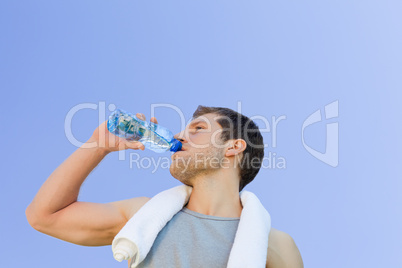 Man drinking water after the gym