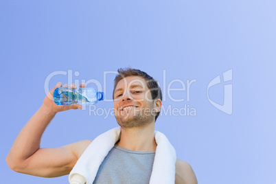 Man drinking water after the gym