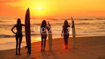 Girls Modeling With Surfboards at Sunrise
