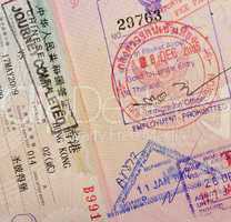 passport with thai and hongkong stamps