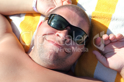 funny tourist face in sunglasses