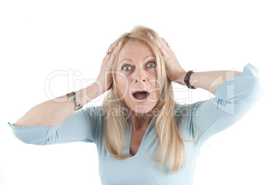 Middle aged woman tearing her hair