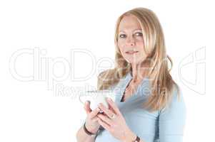 Middle aged woman with a cup